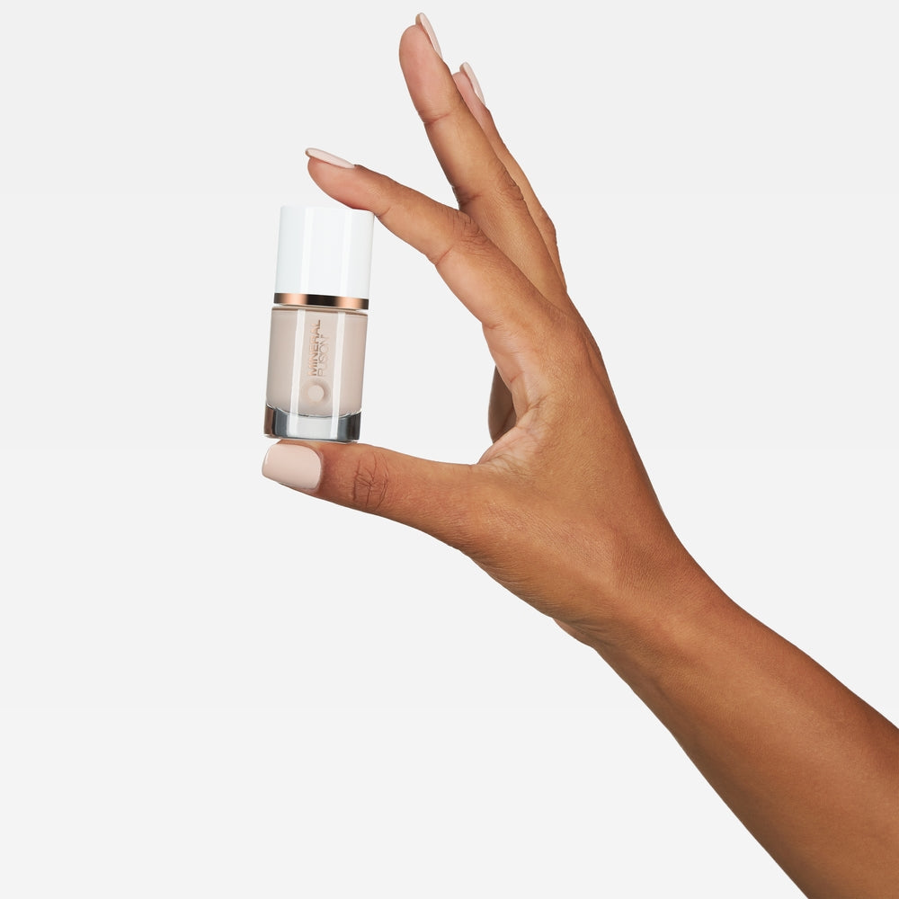 Mineral Fusion Nail Polish 110 Bare Minimum (10ml) with model's hand