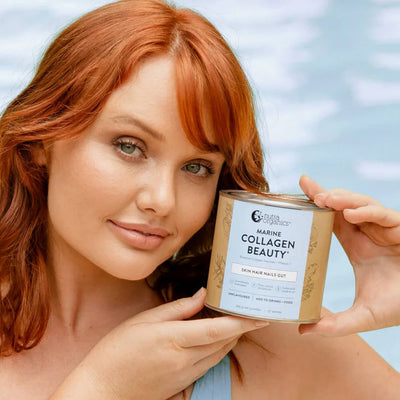 Nutra Organics Marine Collagen Beauty (225g) as held by model