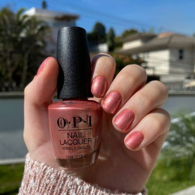 OPI Nail Polish NLM27 Cozu-Melted In The Sun (15ml) in outdoor daylight